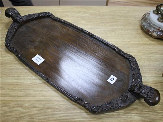 A Burmese carved hardwood tray, 70cm